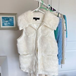 White faux fur vest